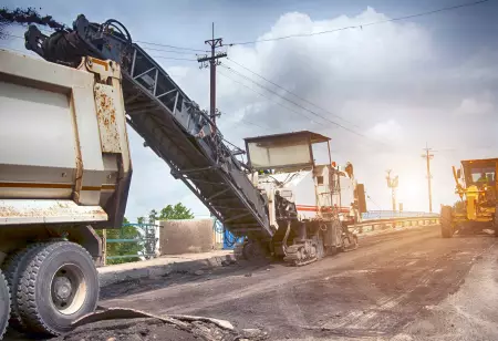 Large,Milling,Machine,Removing,An,Old,Pavement,Layers,At,Full