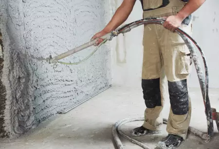 Plastering,The,Interior,Wall,With,An,Automatic,Spraying,Plaster,Pump