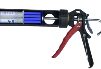 Caulking gun with adaptor and with cartridge mit Kontrast