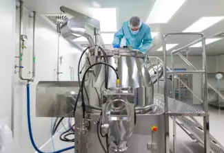 scientist look in steel tank in laboratory